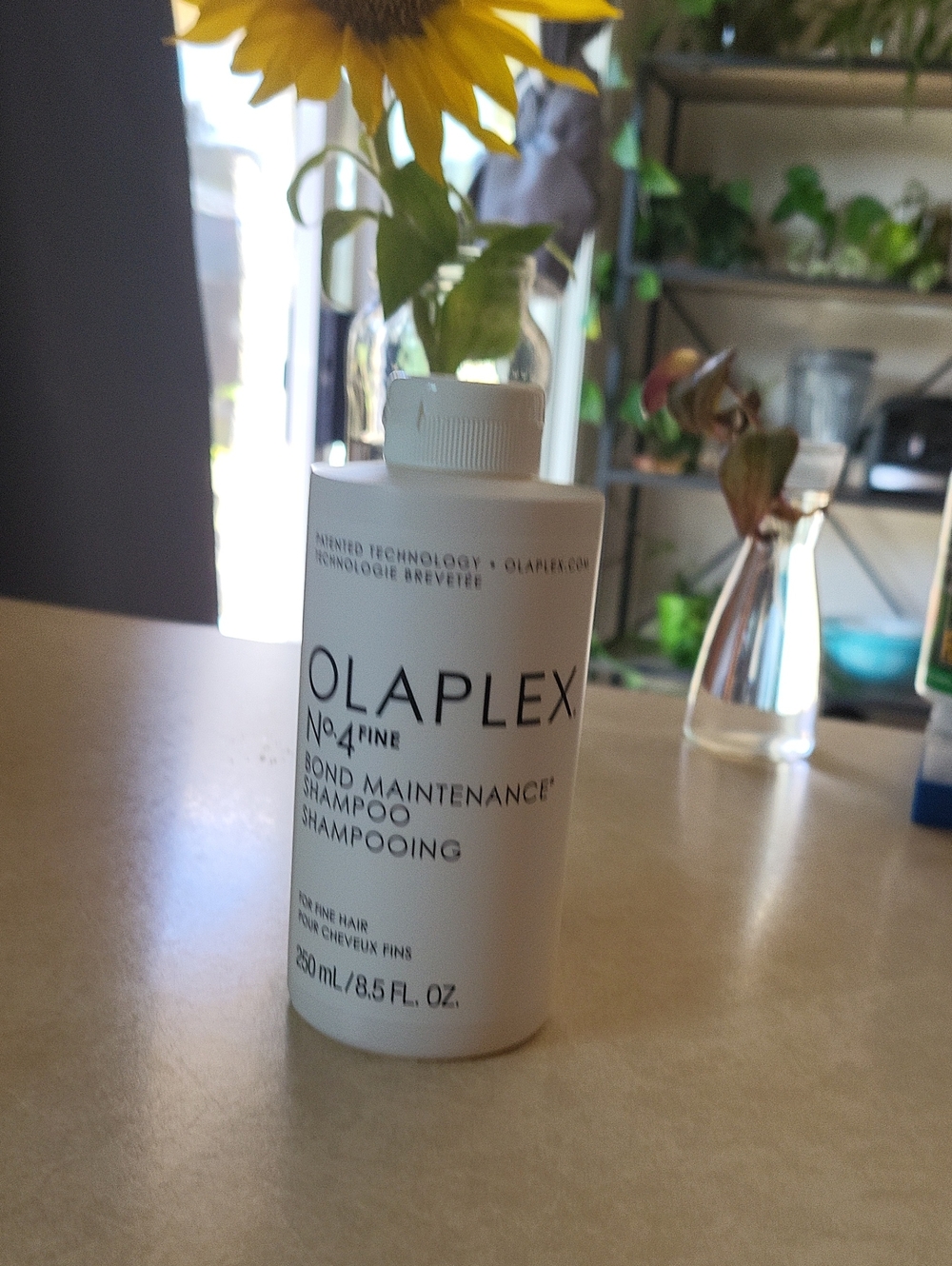 OLAPLEX No.4 Fine Bond Maintenance Shampoo — white